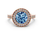 Fancy Blue Round Cut Diamond Halo Engagement Ring Set in Rose gold with Pavé Band and Round Halo Stones