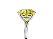 Fancy Yellow Round Cut Diamond Solitaire Engagement Ring Set in Silver with Thin Band and Prong Setting