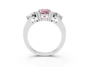 Fancy Pink Oval Cut Diamond Three-Stone Ring Set in Platinum with Prong Setting and Classic Band