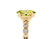 Fancy Yellow Oval Cut Diamond Solitaire Engagement Ring Set in Yellow gold with Bezel Accents on Beaded Band