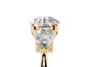 Round Three Stone Engagement Ring Setting | Pear Side Stones | Yellow Gold