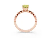 Fancy Yellow Oval Cut Diamond Solitaire Engagement Ring Set in Rose gold with Bezel Accents on Beaded Band