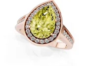 Fancy Yellow Pear Cut Diamond Halo Solitaire Ring Set in Rose gold with Pavé Band and Bezel Setting