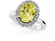 Fancy Yellow Oval Cut Diamond Halo Solitaire Ring Set in White gold with Pavé Band and Prong Setting