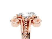 Pear Cut Diamond Twisted Band Solitaire Ring Set in Rose gold with Scroll Prongs