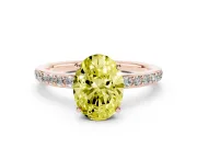 Fancy Yellow Oval Cut Diamond Pavé Band Ring Set in Rose gold with Prong-Set Center Stone