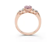 Fancy Pink Oval Cut Diamond Cluster Ring Set in Rose gold with Round Accent Stones and Prong Setting on a Plain Band
