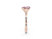 Fancy Pink Pear Cut Diamond Solitaire Ring Set in Rose gold with Bezel Set Side Stones and Prong Setting