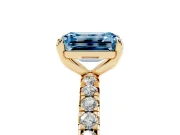 Fancy Blue Emerald Cut Diamond Pavé Solitaire Ring Set in Yellow gold with Round Band and Prong Setting