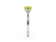 Fancy Yellow Round Cut Diamond Solitaire Set in White gold with Side Baguettes and Channel Set Band