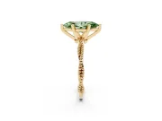 Fancy Green Marquise Cut Diamond Solitaire Ring Set in Yellow gold with Twisted Band and Bead Prong Setting