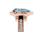 Fancy Blue Pear Cut Diamond Halo Solitaire Ring Set in Rose gold with Pavé Band and Bezel Setting
