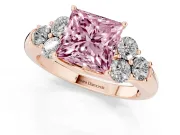Fancy Pink Princess Cut Diamond Cluster Ring Set in Rose gold with Round Accent Stones and Prong Setting on a Plain Band