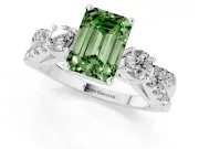 Fancy Green Emerald Cut Diamond Three-Stone Ring Set in White gold with Pavé Split Shank and Prong Setting