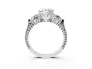 Heart Cut Diamond Three-Stone Ring Set in Platinum with Milgrain Band