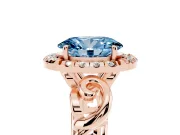 Fancy Blue Oval Cut Diamond Halo Ring Set in Rose gold with Scrollwork Band and Prong Setting