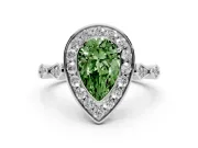 Fancy Green Pear Cut Diamond Halo Engagement Ring Set in White gold with Twisted Band and Prong Setting