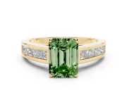 Fancy Green Emerald Cut Diamond Solitaire Ring Set in Yellow gold with Channel-Set Band and Prong Setting
