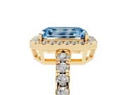 Fancy Blue Emerald Cut Diamond Halo Ring Set in Yellow gold with Delicate Pavé Band and Prong Setting