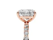 Radiant Cut Diamond Solitaire Ring Set in Rose gold with Round Pavé Band and Prong Setting