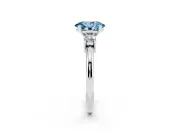 Fancy Blue Three-Stone Oval Cut Diamond Ring Set in White gold with Prong Setting and Plain Band