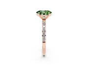 Fancy Green Oval Cut Diamond Solitaire Ring Set in Rose gold with Round Pavé Band and Prong Setting