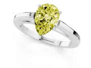 Fancy Yellow Pear Cut Diamond Solitaire Ring Set in Platinum with Prong Setting and Classic Band
