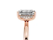 Emerald Cut Diamond Solitaire Engagement Ring Set in Rose gold with Prong Setting and Polished Band