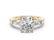 Radiant Cut Diamond Solitaire Ring Set in Yellow gold with Tapered Baguette Side Stones and Prong Setting