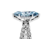 Fancy Blue Marquise Cut Diamond Three-Stone Ring Set in White gold with Pavé Split Shank and Prong Setting