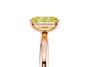 Fancy Yellow Emerald Cut Diamond Solitaire Ring Set in Rose gold with Prong Setting on a Polished Plain Band
