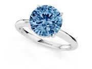 Fancy Blue Round Cut Diamond Solitaire Engagement Ring Set in Silver with Prong Setting and Polished Band
