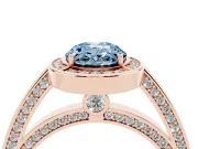 Fancy Blue Oval Cut Diamond Halo Pavé Split Shank Ring Set in Rose gold with Prong Setting