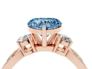 Heart-Shaped Three-Stone Pavé Twist Engagement Ring Setting for a Fancy Blue Lab-Grown Diamond | Split Shank | Rose Gold
