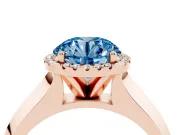 Fancy Blue Round Cut Diamond Halo Ring Set in Rose gold with Cathedral Band and Prong Setting