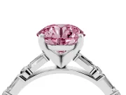 Fancy Pink Round Cut Diamond Solitaire Set in Platinum with Side Baguettes and Channel Set Band