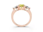 Fancy Yellow Oval Cut Diamond Three-Stone Ring Set in Rose gold with Prong Setting and Classic Band