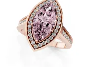 Fancy Pink Marquise Cut Diamond Halo Solitaire Ring Set in Rose gold with Pavé Band and Bezel Setting