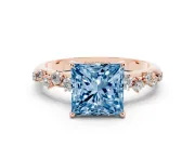 Fancy Blue Princess Cut Diamond Cluster Solitaire Ring Set in Rose gold with Prong Setting