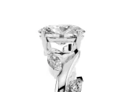 Oval Cut Diamond Solitaire Ring Set in White gold with Twisted Marquise Accent Band