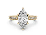 Marquise Cut Diamond Solitaire Ring Set in Yellow gold with Slim Pavé Band and Prong Setting