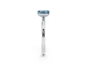 Fancy Blue Emerald Cut Diamond Solitaire Ring Set in Silver with Prong Setting on a Polished Plain Band