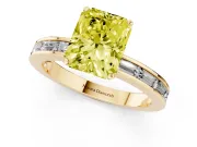 Fancy Yellow Radiant Cut Diamond Solitaire Ring Set in Yellow gold with Channel-Set Baguette Band and Prong Setting