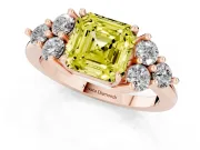 Fancy Yellow Asscher Cut Diamond Solitaire Ring Set in Rose gold with Cluster Accents on Each Side