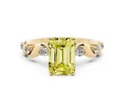 Fancy Yellow Emerald Cut Diamond Solitaire Ring Set in Yellow gold with Ribbon Twist Band, Round Accents and Prong Setting