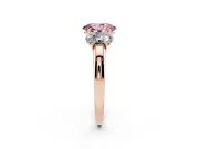 Fancy Pink Oval Cut Diamond Three-Stone Ring Set in Rose gold with Bold Center and Classic Band