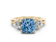 Cushion Cut Hidden Halo Three Stone Engagement Ring Setting for a Fancy Blue Lab-Grown Diamond | Yellow Gold