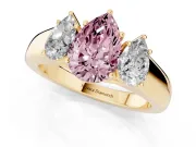 Fancy Pink Three-Stone Pear Cut Diamond Ring Set in Yellow gold with Matching Prong Settings and Plain Band