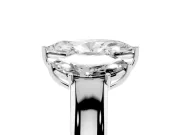 Three-Stone Marquise Cut Diamond Ring Set in Platinum with Matching Prong Settings and Plain Band