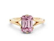 Fancy Pink Emerald Cut Diamond Solitaire Ring Set in Yellow gold with Polished Tapered Band and Prong Setting